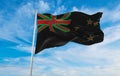 flag of African of New Zealand at cloudy sky background on sunse Royalty Free Stock Photo