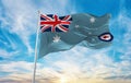 flag of Air Force Ensign of Australia , Australia at cloudy sky background on sunset, panoramic view. Australian travel and