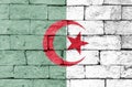 Flag of Algeria on old brick wall. Royalty Free Stock Photo