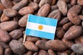 Flag of Argentina on cacao beans