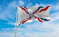 flag of the Assyrians waving in wind at cloudy sky. love holy spirit faith, people hope in easter, religion concept. Copy space