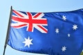 The flag of Australia waving in the sky. Royalty Free Stock Photo