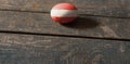 Flag of Austria on a painted egg on a wooden board. Easter in Ukraine. Royalty Free Stock Photo