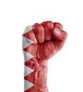 Flag of Bahrain painted on human fist like victory symbol