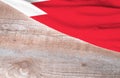 Flag Bahrain and space for text on a wooden background