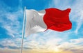 flag of Bari, Italy at cloudy sky background on sunset, panoramic view. Italian travel and patriot concept. copy space for wide