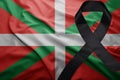 Flag of basque country with black mourning ribbon Royalty Free Stock Photo