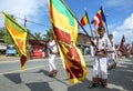 Flag bearers carrying the Sri Lankan flag during the Hikkaduwa Perahara.