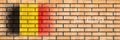 Flag of Belgium. Flag painted on a brick wall. Brick background. Copy space. Textured background Royalty Free Stock Photo