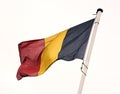 The flag of Belgium. Shot of the Belgian flag blowing in the wind. Royalty Free Stock Photo