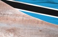 Flag Botswana and space for text on a wooden background