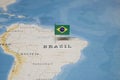The Flag of brazil in the world map Royalty Free Stock Photo