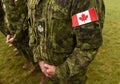 Flag of Canada on military uniform. Canadian soldiers. Army of Canada. Remembrance Day