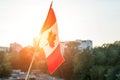 Flag of Canada from window sunset background Royalty Free Stock Photo