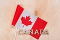 Flag of Canada, the word Canada in wooden abstract letters Royalty Free Stock Photo