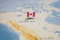 The Flag of canada in the world map Royalty Free Stock Photo