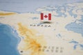 The Flag of canada in the world map Royalty Free Stock Photo