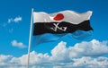 flag of Chukotko-Kamchatkan peoples Evenks at cloudy sky background, panoramic view. flag representing ethnic group or culture, Royalty Free Stock Photo