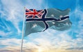 flag of Civil Air Ensign of Australia , Australia at cloudy sky background on sunset, panoramic view. Australian travel and