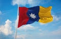 flag of Civil ensign of New Granada , Colombia at cloudy sky background on sunset, panoramic view. Colombian travel and patriot