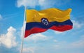flag of Civil ensign of United States , Colombia at cloudy sky background on sunset, panoramic view. Colombian travel and patriot