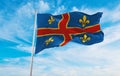 flag of Clermont Ferrand, France at cloudy sky background on sunset, panoramic view. French travel and patriot concept. copy