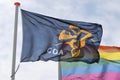 Flag of the COA and a rainbow flag in front of an AZC Royalty Free Stock Photo