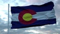 Flag of Colorado waving in the wind against deep beautiful clouds sky. 3d rendering