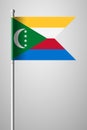 Flag of Comoros. National Flag on Flagpole. Isolated Illustration on Gray Royalty Free Stock Photo