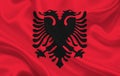 Flag of the country of Albania on a background of wavy silk fabric
