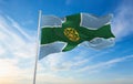 flag of county Derbyshire , UK at cloudy sky background on sunset, panoramic view. County of united kingdom of great Britain,