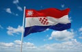 flag of Croatia 1941 1945, Europe at cloudy sky background, panoramic view. flag representing extinct country,ethnic group or