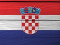 Flag of Croatia on wooden wall background. Grunge Croat flag texture.