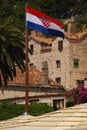 Flag of Crotia Waving in the Wind at Hvar Town Royalty Free Stock Photo