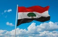 flag of Cushitic peoples Oromo people at cloudy sky background, panoramic view. flag representing ethnic group or culture,