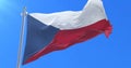 Flag of the Czech Republic waving at wind with blue sky, loop