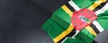 Flag of Dominica. Fabric textured Dominica flag isolated on dark background. 3D illustration Royalty Free Stock Photo