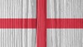 The flag of England on a dry wooden surface, cracked with age. It seems to flutter in the wind. Background, wallpaper or backdrop Royalty Free Stock Photo