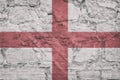 Flag of the England on stone wall, grunge background