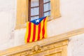 The flag Estelada on the facade of the building. Before the referendum on independence, Tarragona, Catalonia, Spain. Close-up.