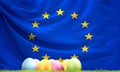 Flag of Europe with Easter eggs and green blades of grass 3D Rendering