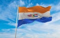 flag of European South Africans at cloudy sky background, panoramic view. flag representing extinct country,ethnic group or