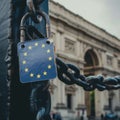 Flag of the European Union on a chain attached to a gate. Royalty Free Stock Photo