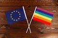 Flag of European Union and flag of LGBT crossed with each other. The image illustrates the relationship between countries