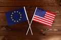 Flag of European Union and flag of USA crossed with each other. The image illustrates the relationship between countries