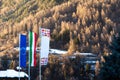 The flag of European Union, Italy and other countries are developing against the backdrop of Dolomites in the spring Royalty Free Stock Photo