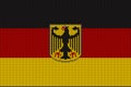 Flag and federal coat of arms of Germany on a vector knitted woolen texture