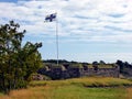 Flag of Finland in Suomenlinna Maritime fortress on the Islands in the harbour of Helsinki Royalty Free Stock Photo