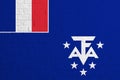 Flag of French Southern and Antarctic Territories. Brick wall texture of the flag of French Southern and Antarctic Territories