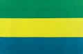 Flag of the Gabonese Republic on a textile basis close-up